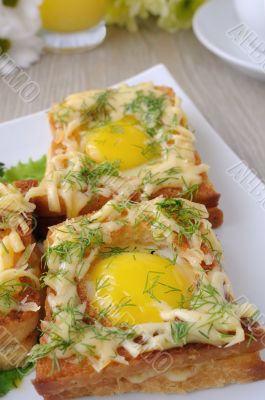 Toast with egg and cheese with dill