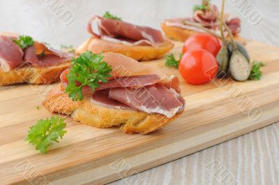 slices of bread with spanish serrano hamon 