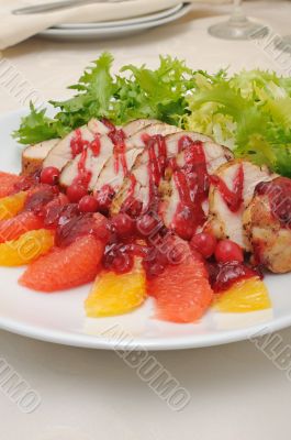 Sliced â€‹â€‹baked fillet with cranberry sauce