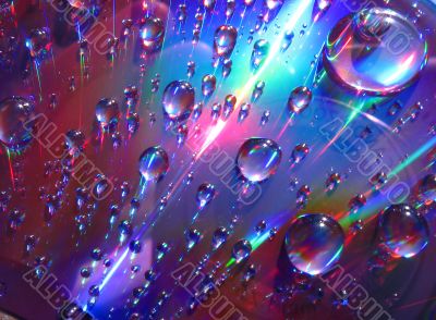 Drops of water on the compact disk Drops of water on the compact disk