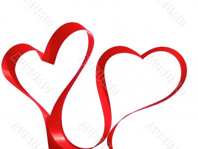 Two hearts made from red silky ribbon