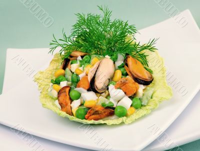 Seafood cocktail in the leaves of savoy cabbage