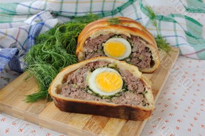 Meatloaf with egg and greens in the test Meatloaf with egg and greens in the test
