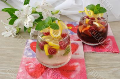 Fresh homemade lemonade with mint and raspberries