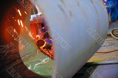 naval welder with protective mask welding metal 