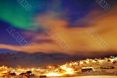 Tasiilaq in mist and northern lights