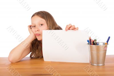 Demoralized child shows a white sheet