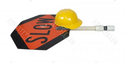 Slow Sign on Pole with Construction Hat