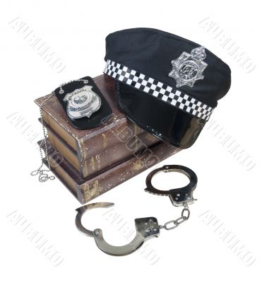 Police and Crime Books with Police Hat, Badge and Handcuffs Police and Crime Books with Police Hat, Badge and Handcuffs