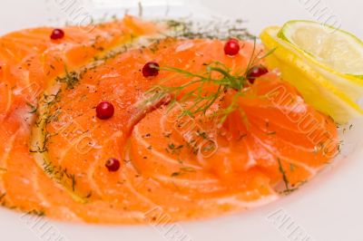 Salmon carpaccio with pink pepper