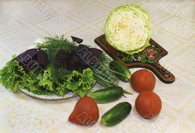 Lettuce, dill, onions and vegetables: tomatoes, cucumbers, cabba