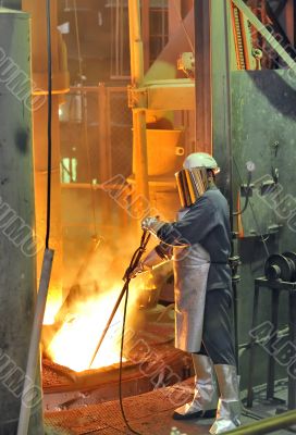 worker with hot steel worker with hot steel