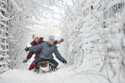 Kids sliding in winter time Kids sliding in winter time
