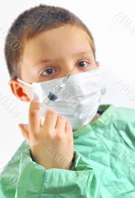 doctor boy with protective mask preparing to inject 