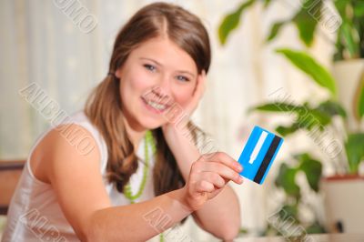 teen girl with blank credit card 