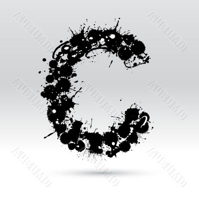 Letter C formed by inkblots