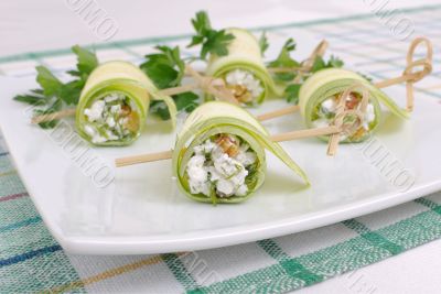 Rolls of zucchini with ricotta