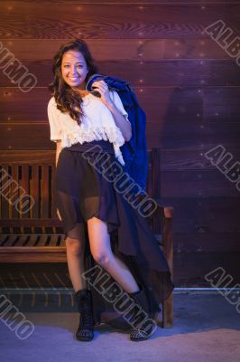 Mixed Race Young Adult Woman Portrait Against Wooden Wall