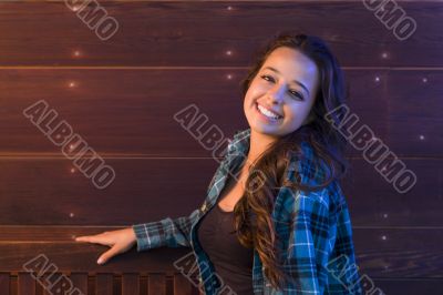 Mixed Race Young Adult Woman Portrait Sitting on Wood Bench