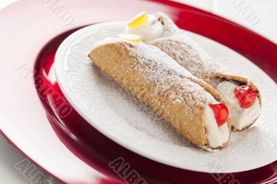 Two Tasty Cannoli on Plate