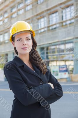 Portrait of Female Contractor Wearing Hard Hat at Construction S Portrait of Female Contractor Wearing Hard Hat at Construction S
