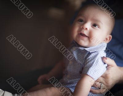 Cute Mixed Race Infant with Parents