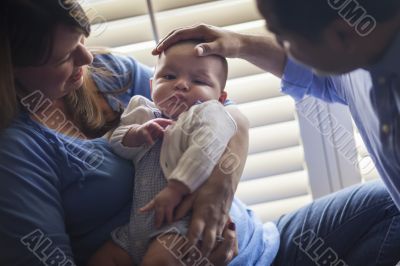 Mixed Race Couple Enjoying Their Newborn Son