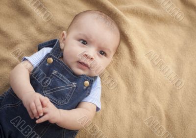 Mixed Race Baby Boy Laying on Blanket