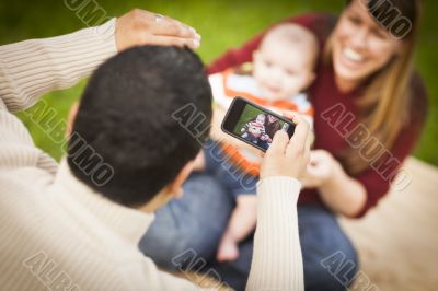 Happy Mixed Race Parents and Baby Boy Taking Self Portraits Happy Mixed Race Parents and Baby Boy Taking Self Portraits