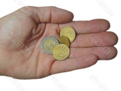 Euro coin and euro cents on the male hand Euro coin and euro cents on the male hand