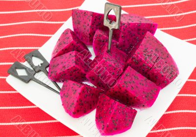 dragon fruits and  slice on plate 