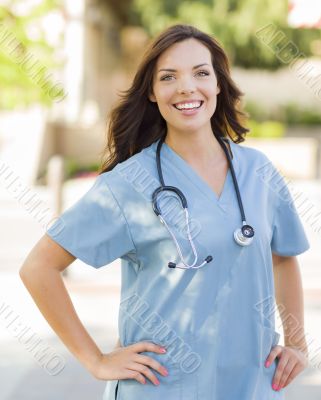 Young Adult Woman Doctor or Nurse Portrait Outside