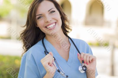 Young Adult Woman Doctor or Nurse Portrait Outside