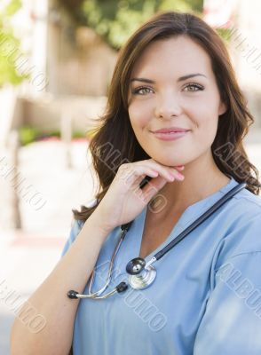 Young Adult Woman Doctor or Nurse Portrait Outside