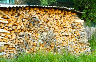 Firewood in a large number of stacked in a pile