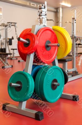 plates for strength training on the stand