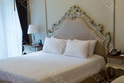 Double bed in the hotel room Double bed in the hotel room