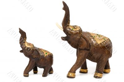 Two wooden statues of elephants