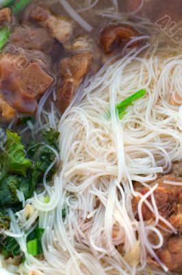 Thai noodle soup and pork meat