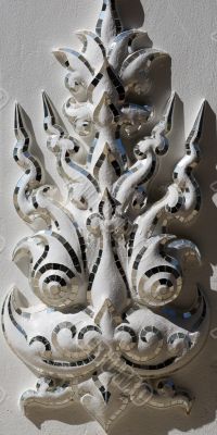 Asian sculpture of the deity face close-up of the White Temple i