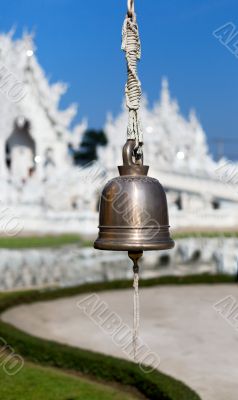 bell on the front of the White Temple Chiang Mai