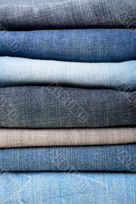stack of blue jeans background