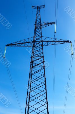 High-voltage line on blue sky background