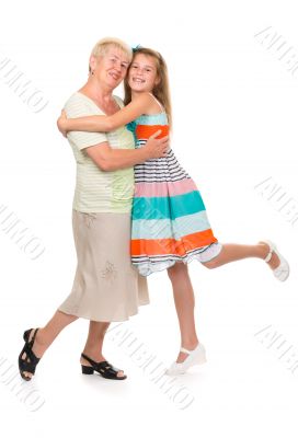 Grandmother with her granddaughter in the studio