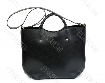 Elegant black female bag over white background