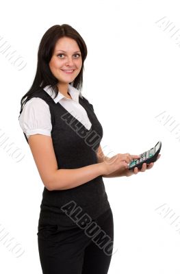 Beautiful smiling girl with a calculator in hand