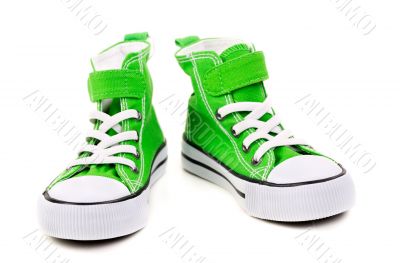 green sneakers with white laces