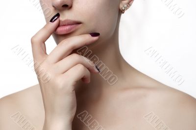female hand, shoulder and lips