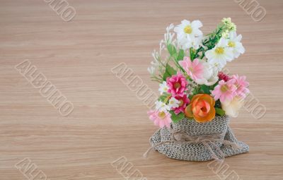 Decorative flower on wooden desk