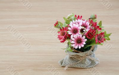 Decorative flower on wooden desk